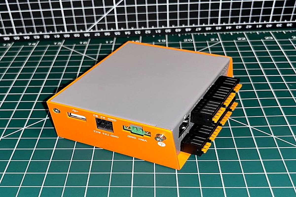 EDATEC ED-IPC1220 industrial computer on a cutting mat